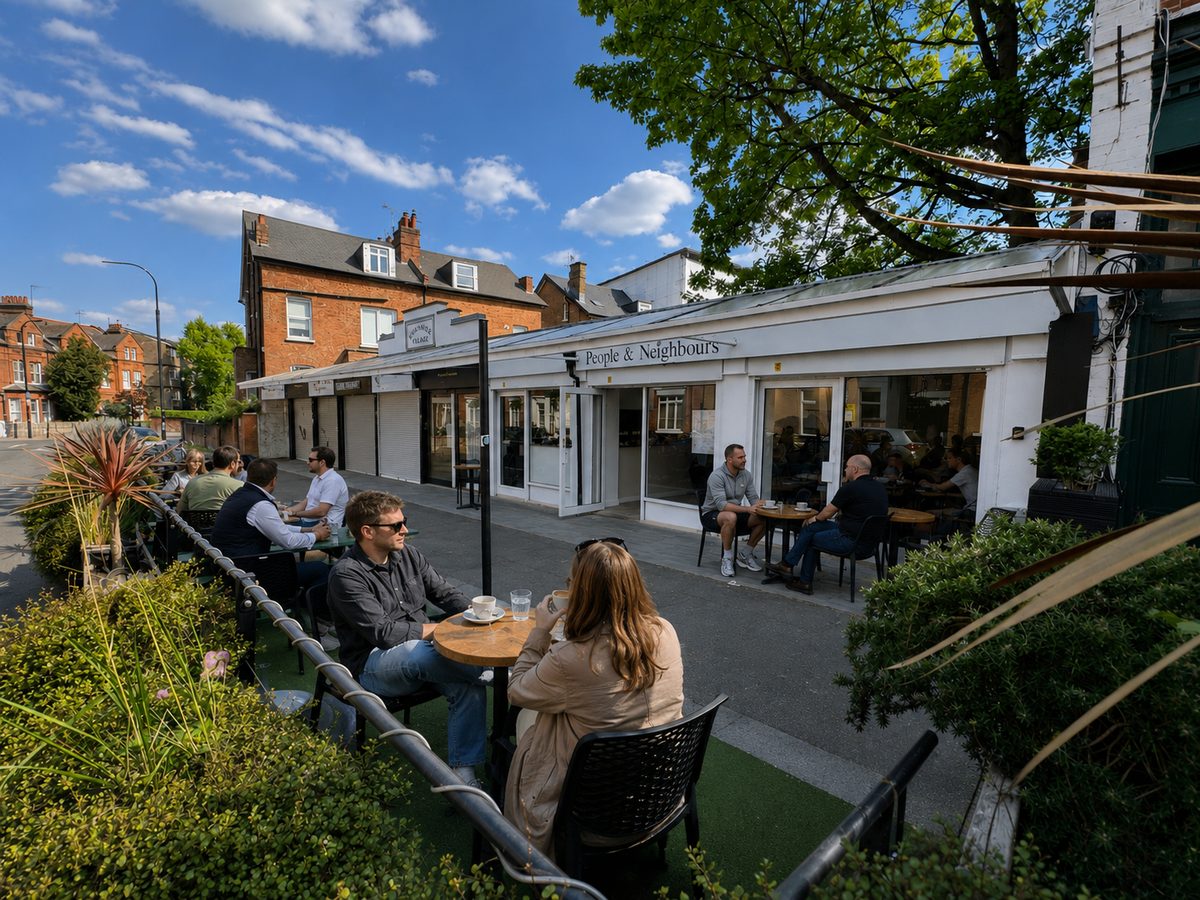 People & Neighbours café storefront and outdoor seating on Broadwell Parade, West Hampstead